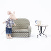 Maileg dad mouse standing by sofa, table with cup of tea
